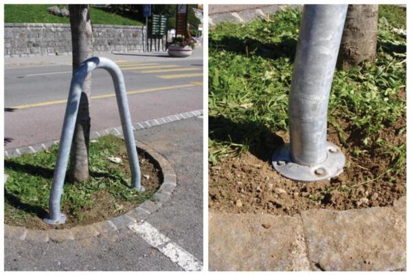 Tree protection bracket with drive-in ground anchor